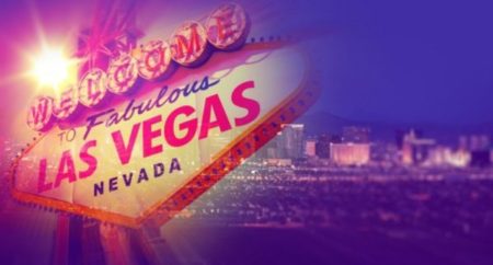 Las Vegas sign super imposed against Las Vega nevada