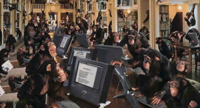 many chimpanzees working on computers